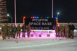 Gen. Stephen Whiting, commander, U.S. Space Command, and personnel from the 821st Space Group pose in front of the Pituffik Space Base, Greenland, Dec. 5, 2025. As the Department of War's northernmost installation, Pituffik's missile warning, missile defense, and Space Domain Awareness mission play a crucial role in the defense of our homeland and the American people.