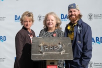 From left, Newport News Shipbuilding President Kari Wilkinson, ship’s sponsor Pam Bove, and NNS welder Andrew Kahler at the keel laying ceremony for Virginia-class attack submarine Barb (SSN 804) at HII’s Newport News Shipbuilding division on Tuesday, Dec. 9, 2025.