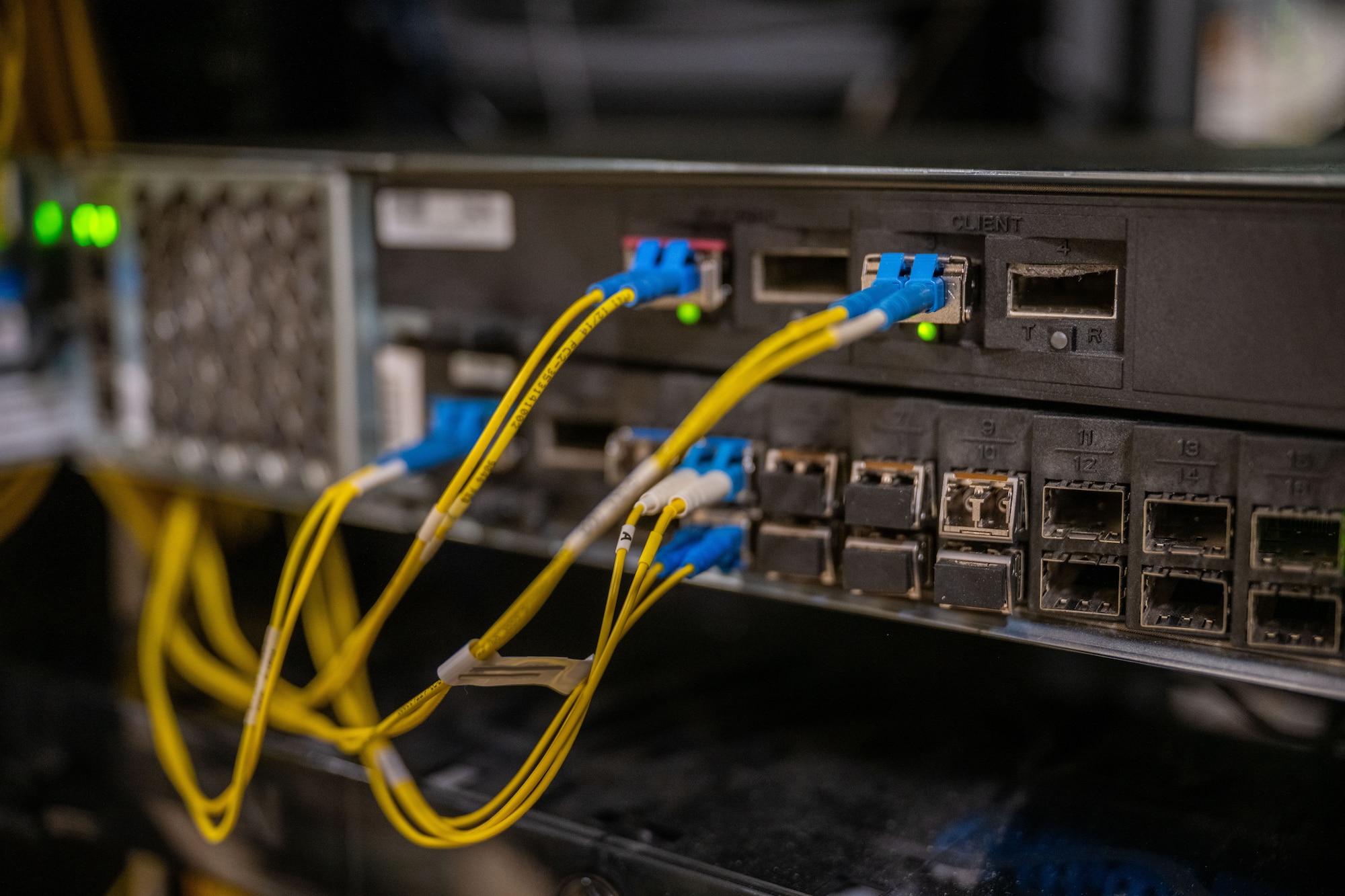 22nd Communication Squadron brings Next Generation 911 equipment online following the installation’s transition to the Kansas Emergency Services IP Network (ESInet) at McConnell Air Force Base, Kansas, Dec. 5, 2025. McConnell became the first Air Force installation to connect its 911 system over fiber, improving emergency response readiness. (U.S. Air Force photo by Senior Airman Paula Arce)