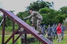 U.S Air Force Lt. Sung Choi, Air Education and Training Command Pacific Engineer Readiness Challenge translator, completes an obstacle course during the Pacific Engineer Readiness Challenge at Andersen Air Force Base, Guam, Sept. 23, 2025.