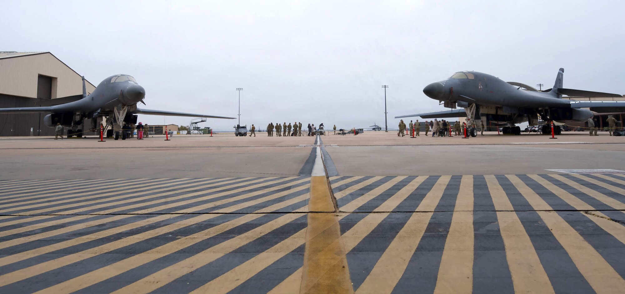 U.S. Air Force B-1B Lancers sit on the flightline during the annual Weapons Load Crew of the Year competition at Dyess Air Force Base, Texas, Dec. 4, 2025. The event featured teams from the 9th and 28th Bomber Generation Squadrons competing for the title of the 7th Bomb Wing’s best load crew. (U.S. Air Force photo by Senior Airman Emma Anderson)