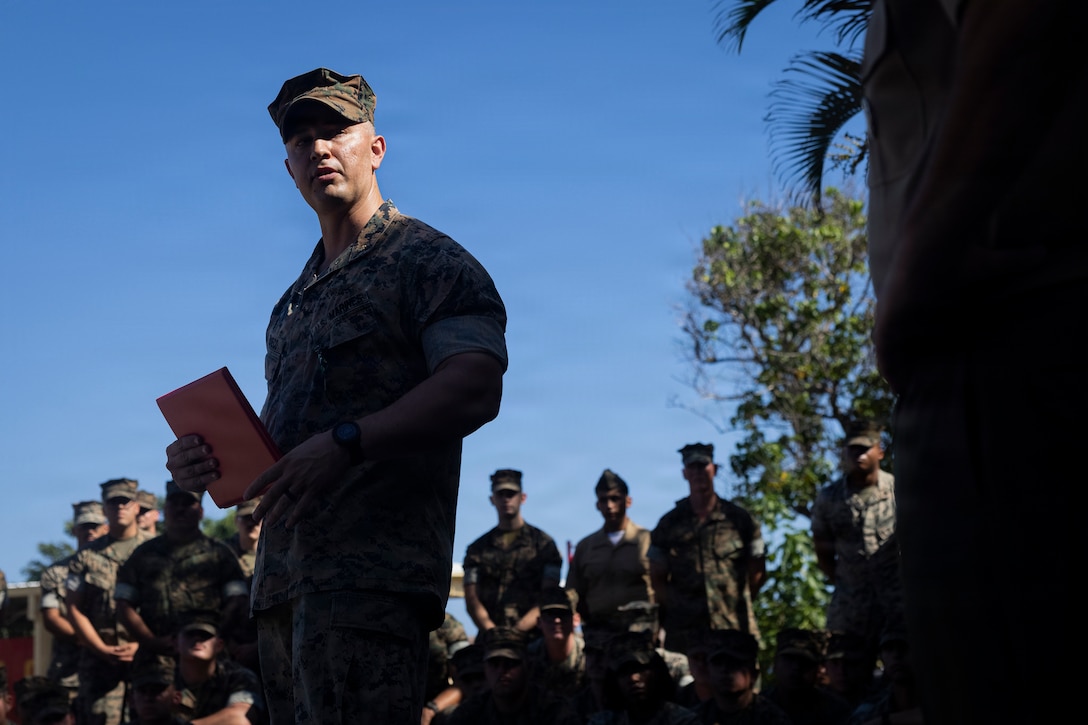 U.S. Marine Corps Maj. Daniel J. Pacheco, an assistant air officer with 3rd Marine Littoral  Regiment, 3rd Marine Division, delivers remarks during an award ceremony on Marine Corps  Base Hawaii, Nov. 26, 2025.