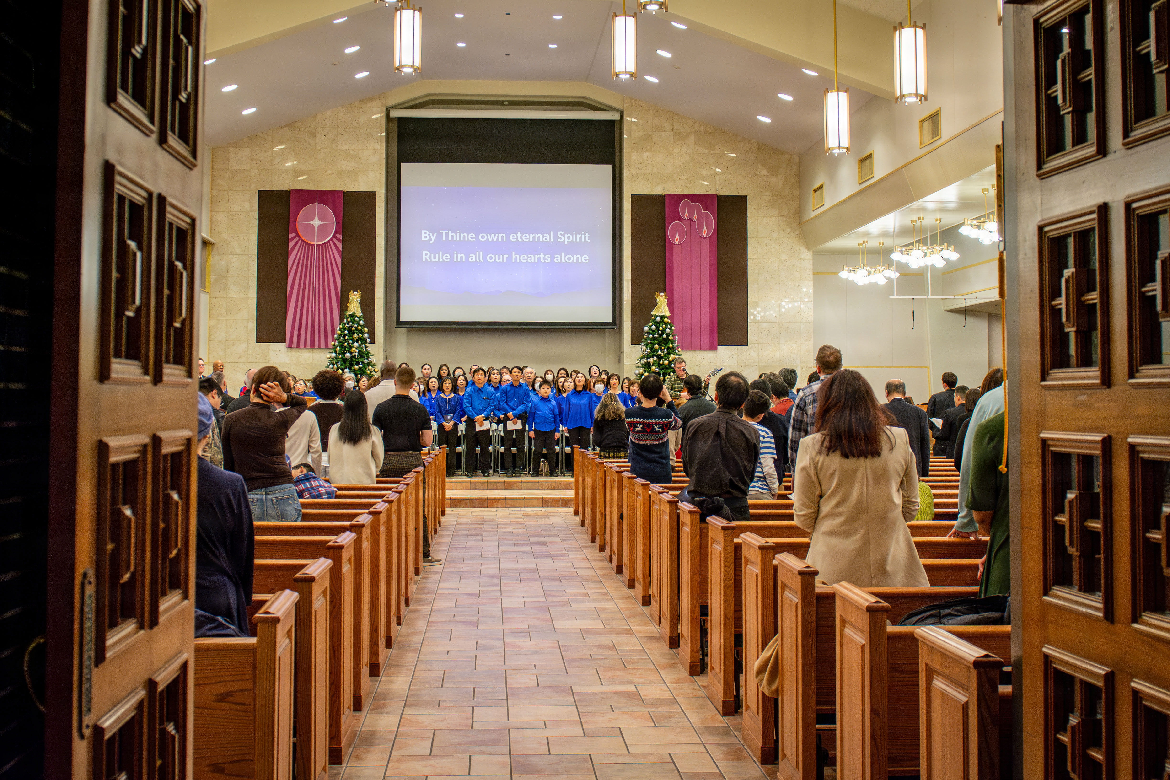The Yokosuka Citizenship Committee Gospel Choir, a combined worship choir from made up of church members from around the City of Yokosuka, lead guests in song at the 2025 International Christmas Celebration at Commander, Fleet Activities Yokosuka's Chapel of Hope Sunday, December 7, 2025.