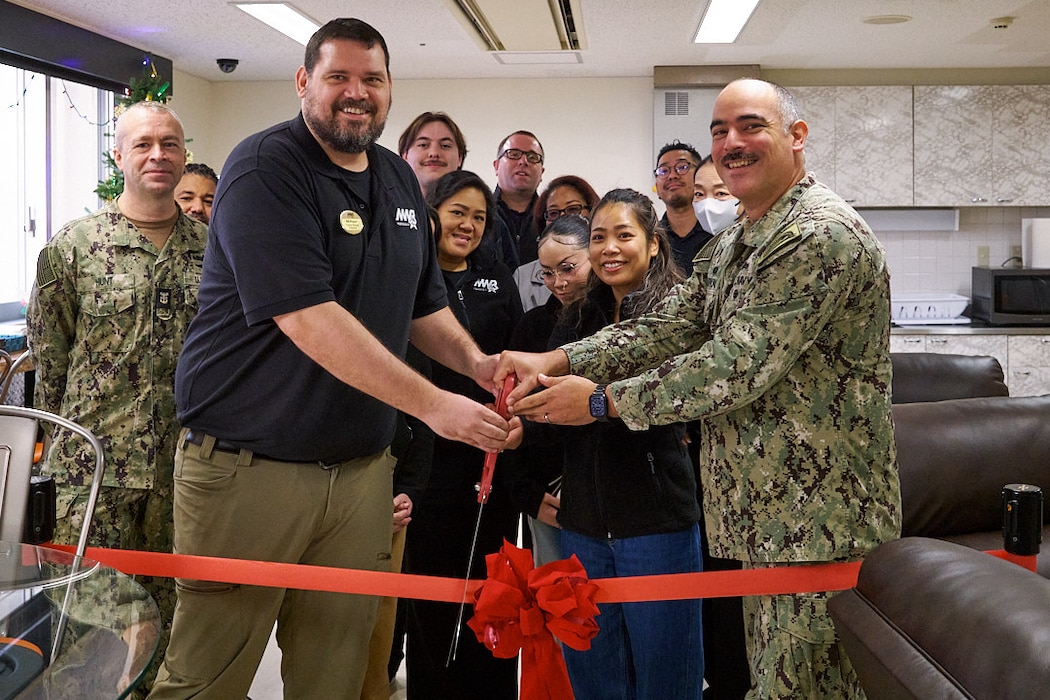 Capt. Jonathan Hopkins, Commander, Fleet Activities Yokosuka (CFAY), and Bill Wagner, CFAY Morale, Welfare, and Recreation (MWR) Liberty Program Manager, cut a ceremonial ribbon at the Satellite Liberty Center located in Unaccompanied Housing Building 3337 Wednesday, December 10, 2025.