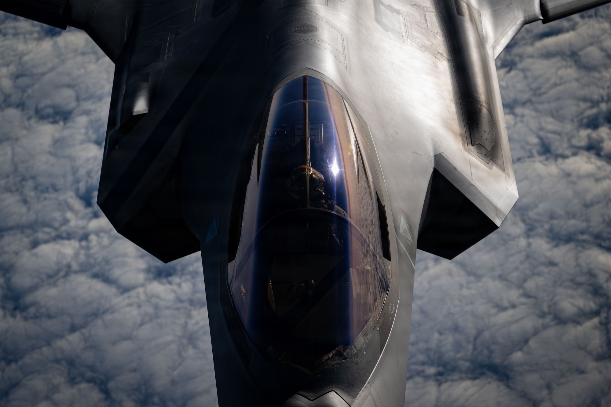 A U.S. Air Force 48th Fighter Wing F-35 Lightning II approaches a 100th Air Refueling Wing KC-135 Stratotanker, over the Baltic Sea