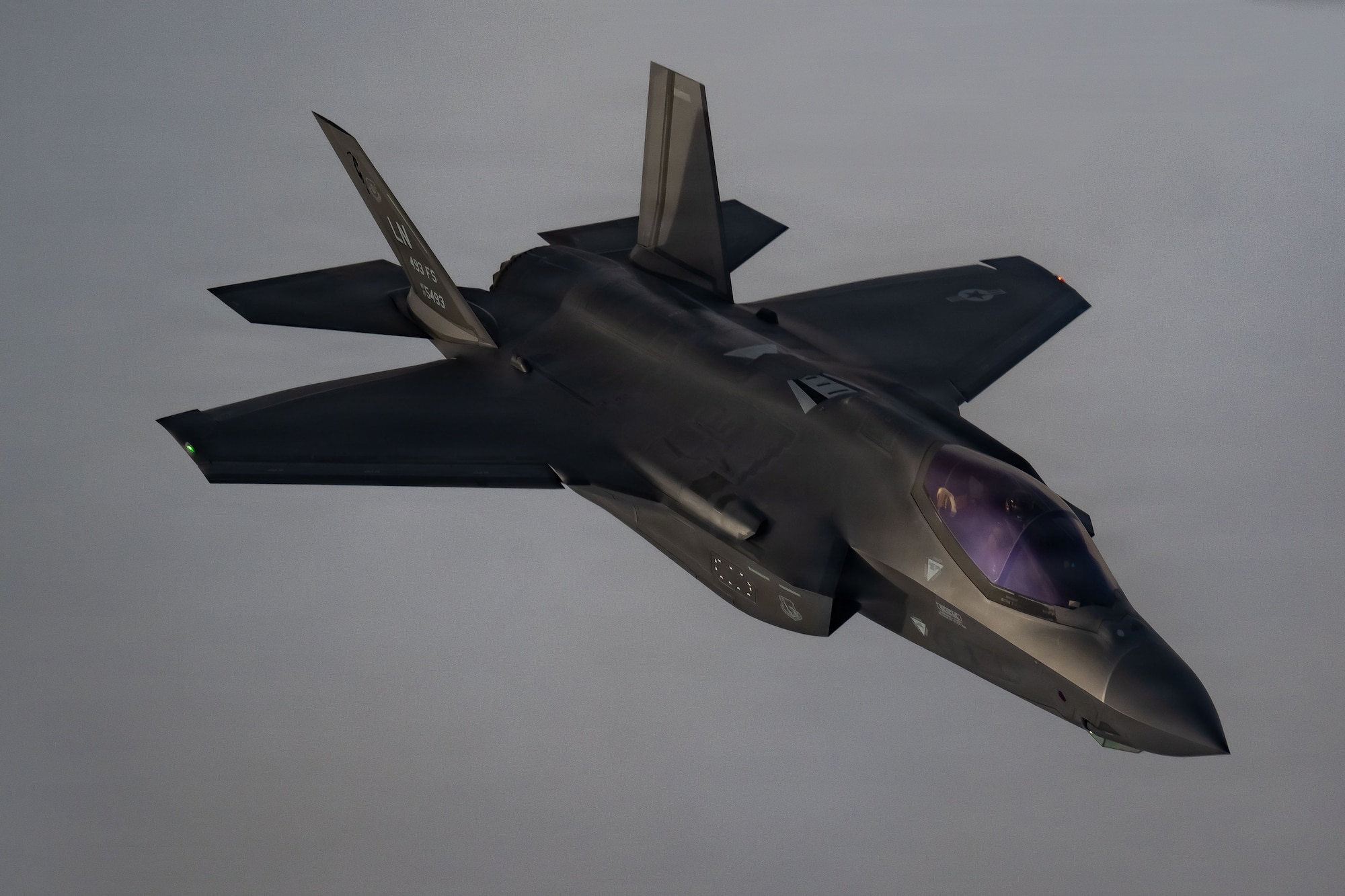 A U.S. Air Force 48th Fighter Wing F-35 Lightning II descends from a 100th Air Refueling Wing KC-135 Stratotanker over the Baltic Sea