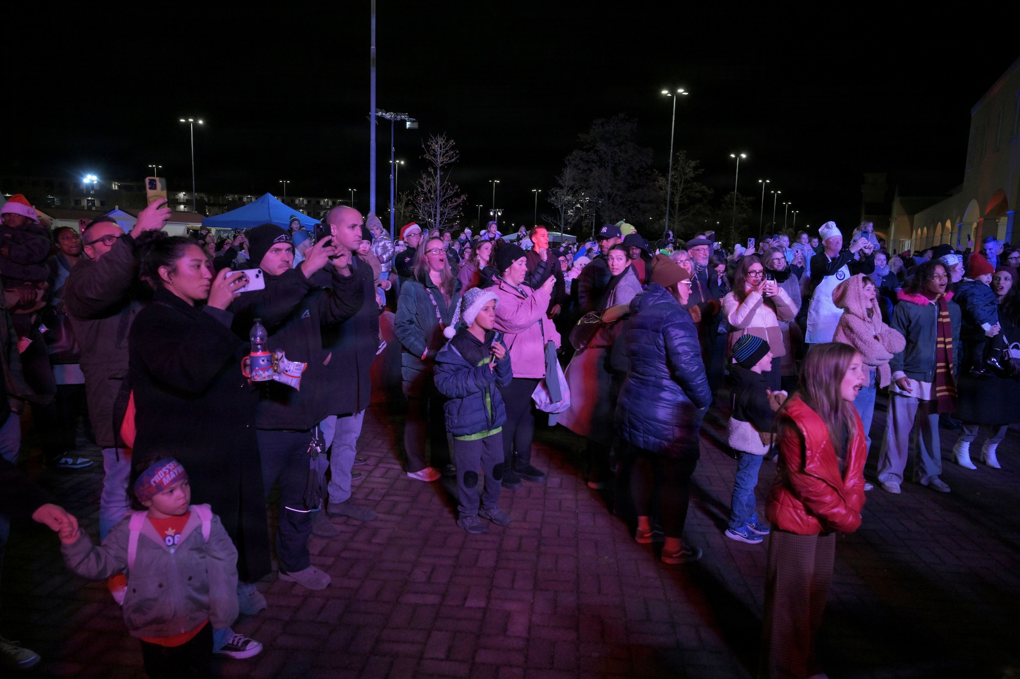 Wyverns celebrate a tree lighting ceremony in artificial snow
