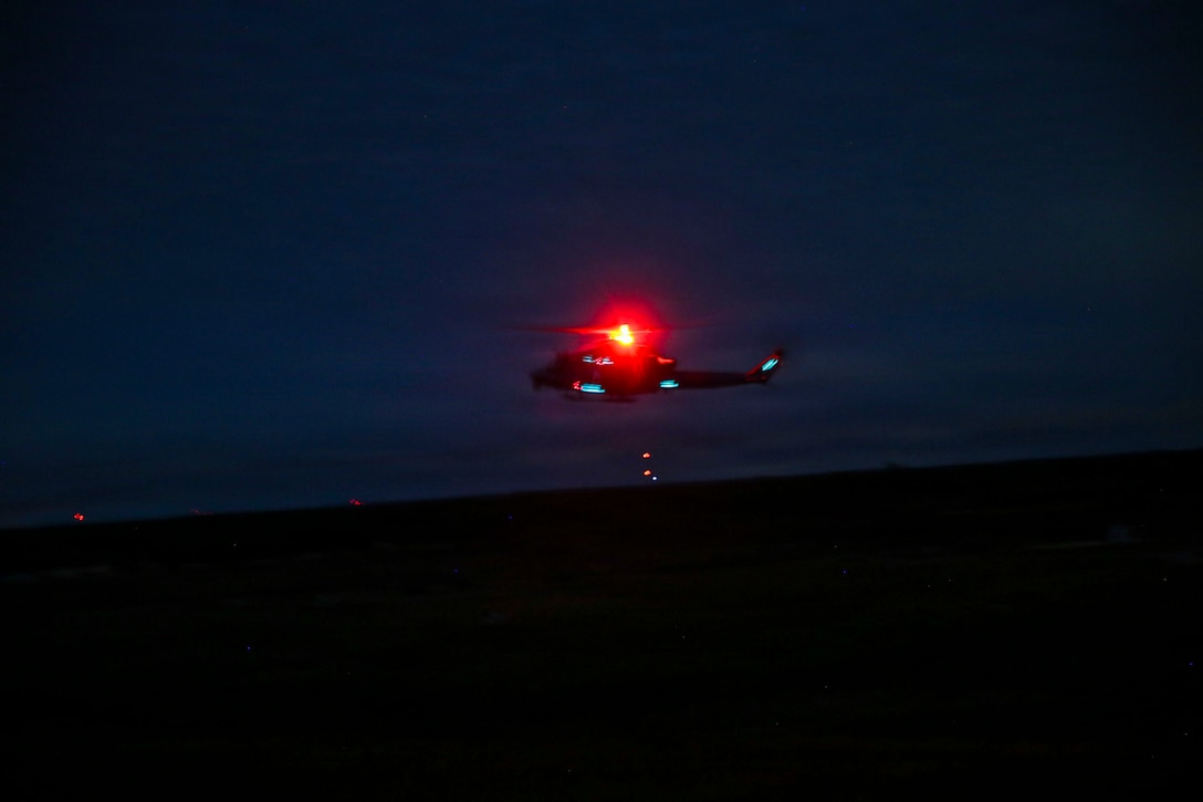 A U.S. Marine Corps helicopter with Marine Fighting Squadron (VMFA) 112 performs a simulated ammo resupply during a tactical air-control party (TACP) exercise in Hattiesburg, Mississippi, Dec. 3, 2025. TACP exercises prepare prospective joint terminal attack controllers and joint fires observers for formal schools. (U.S. Marine Corps photos by Lance Cpl. Payton Goodrich)