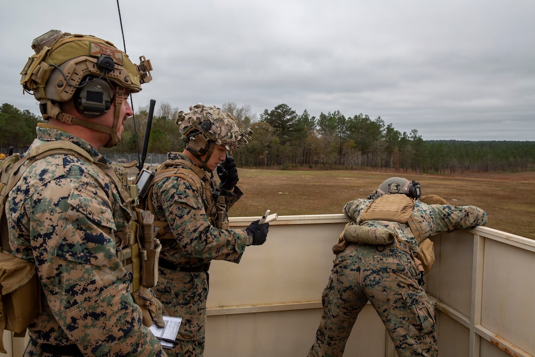 U.S. Marine Corps Staff Sgt. Brian Wu, Staff Sgt. Remy Margosian and Cpl. Brian Clemente joint tactical air controllers with 4th Naval Gunfire Liaison Company, Force Headquarters Group, Marine Forces Reserve, participate in a tactical air-control party (TACP) exercise at Rattlesnake Range, Hattiesburg, Mississippi, Dec. 2, 2025. TACP exercises prepare prospective joint terminal attack controllers and joint fires observers for formal schools. (U.S. Marine Corps photo by Lance Cpl. Payton Goodrich)