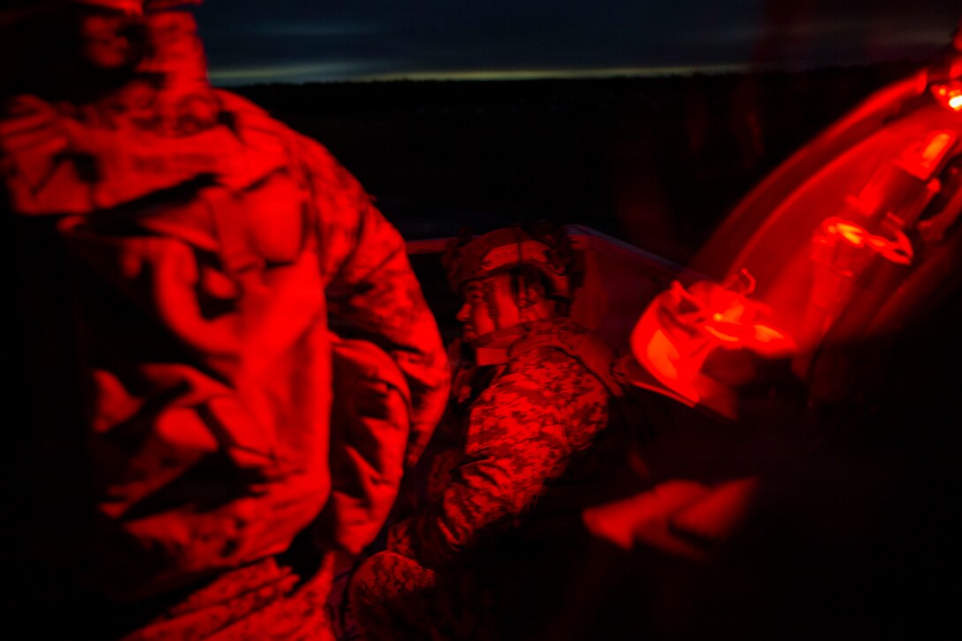 U.S. Marine Corps Cpl. Isaac Cuellar, a joint fires observer with 3rd Naval Gunfire Liaison Company, Force Headquarters Group, Marine Forces Reserve, calls for close air support during a tactical air-control party (TACP) exercise at Rattlesnake Range, Hattiesburg, Mississippi, Dec. 2, 2025. TACP exercises prepare prospective joint terminal attack controllers and joint fires observers for formal schools. (U.S. Marine Corps photo by Lance Cpl. Payton Goodrich)