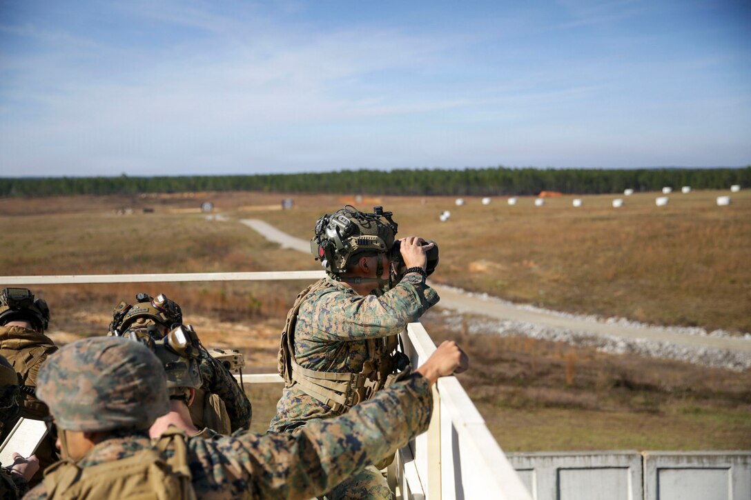 U.S. Marine Corps Cpl. Isaac Cuellar, a joint fires observer with 3rd Naval Gunfire Liaison Company, Force Head Quarters, Marine Forces Reserve, searches for an incoming F-18 during a close air support run in a tactical air-control party (TACP) exercise at Rattlesnake Range, Hattiesburg, Mississippi, Dec. 3, 2025. TACP exercises prepare prospective joint terminal attack controllers and joint fires observers for formal schools. (U.S. Marine Corps photos by Lance Cpl. Payton Goodrich)
