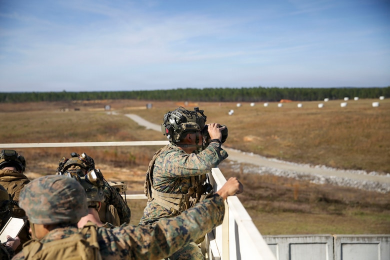 U.S. Marine Corps Cpl. Isaac Cuellar, a joint fires observer with 3rd Naval Gunfire Liaison Company, Force Head Quarters, Marine Forces Reserve, searches for an incoming F-18 during a close air support run in a tactical air-control party (TACP) exercise at Rattlesnake Range, Hattiesburg, Mississippi, Dec. 3, 2025. TACP exercises prepare prospective joint terminal attack controllers and joint fires observers for formal schools. (U.S. Marine Corps photos by Lance Cpl. Payton Goodrich)