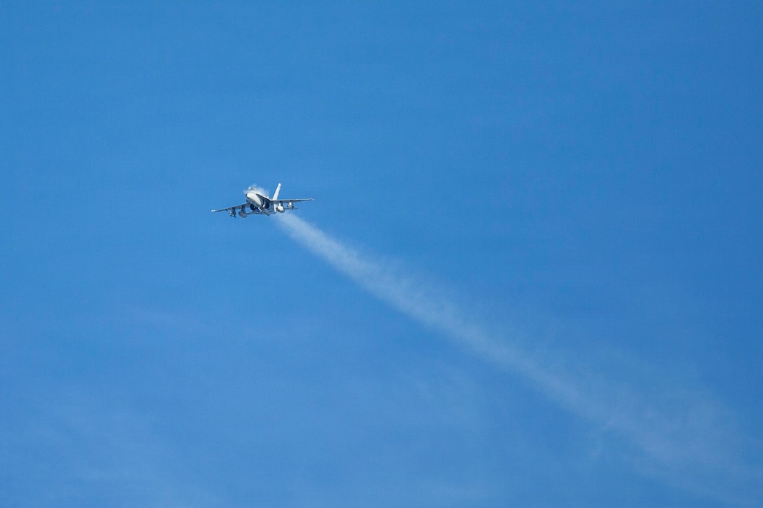 A U.S. Marine Corps F/A-18C Hornet aircraft with Marine Fighting Squadron (VMFA) 112 conducts close air support in support of Marines with 3rd Naval Gunfire Liaison Company, Force Headquarters Group, Marine Forces Reserve, during a tactical air-control party (TACP) exercise at Rattlesnake Range, Hattiesburg, Mississippi, Dec. 3, 2025. TACP exercises prepare prospective joint terminal attack controllers and joint fires observers for formal schools. (U.S. Marine Corps photos by Lance Cpl. Payton Goodrich)