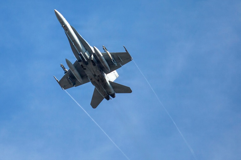 A U.S. Marine Corps F/A-18C Hornet aircraft with Marine Fighting Squadron (VMFA) 112 conducts close air support in support of Marines with 3rd Naval Gunfire Liaison Company, Force Headquarters Group, Marine Forces Reserve, during a tactical air-control party (TACP) exercise at Rattlesnake Range, Hattiesburg, Mississippi, Dec. 3, 2025. TACP exercises prepare prospective joint terminal attack controllers and joint fires observers for formal schools. (U.S. Marine Corps photos by Lance Cpl. Payton Goodrich)