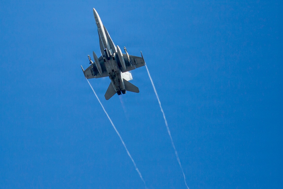 A U.S. Marine Corps F/A-18C Hornet aircraft with Marine Fighting Squadron (VMFA) 112 conducts close air support in support of Marines with 3rd Naval Gunfire Liaison Company, Force Headquarters Group, Marine Forces Reserve, during a tactical air-control party (TACP) exercise at Rattlesnake Range, Hattiesburg, Mississippi, Dec. 3, 2025. TACP exercises prepare prospective joint terminal attack controllers and joint fires observers for formal schools. (U.S. Marine Corps photos by Lance Cpl. Payton Goodrich)