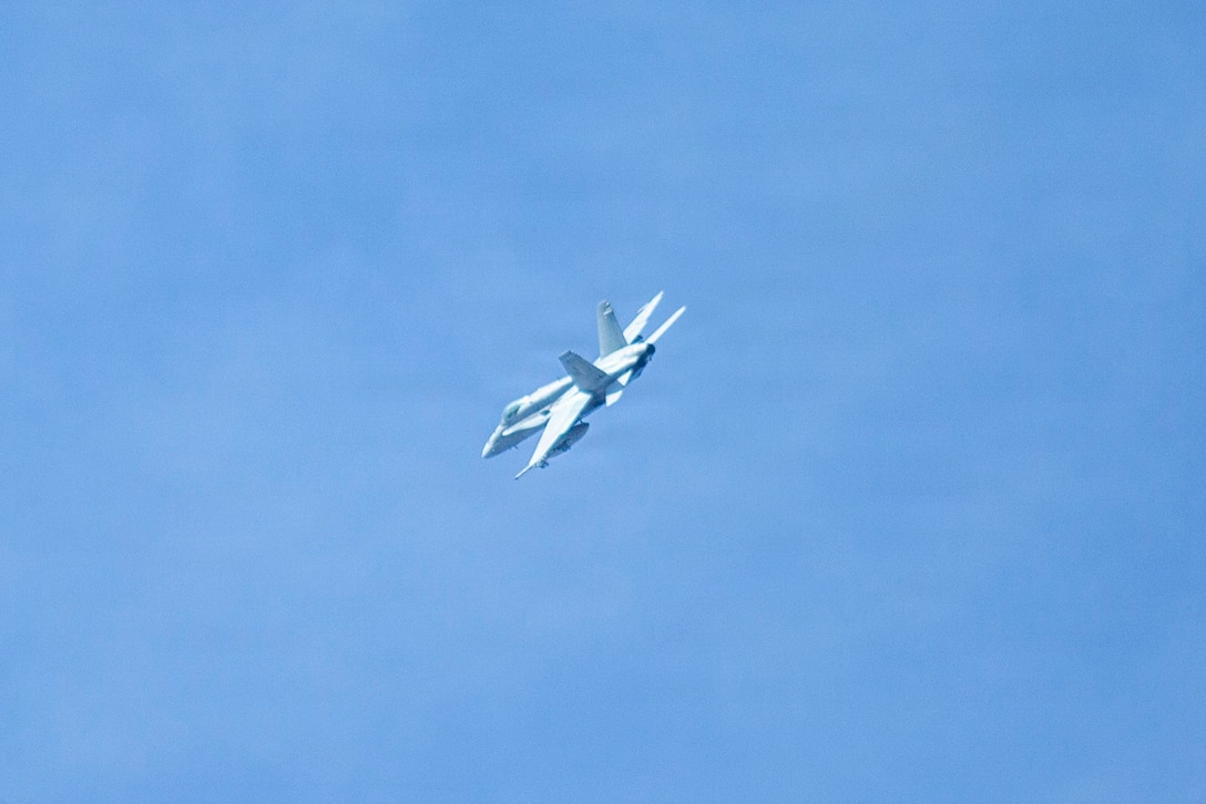 A U.S. Marine Corps F/A-18C Hornet aircraft with Marine Fighting Squadron (VMFA) 112 conducts close air support in support of Marines with 3rd Naval Gunfire Liaison Company, Force Headquarters Group, Marine Forces Reserve, during a tactical air-control party (TACP) exercise at Rattlesnake Range, Hattiesburg, Mississippi, Dec. 3, 2025. TACP exercises prepare prospective joint terminal attack controllers and joint fires observers for formal schools. (U.S. Marine Corps photos by Lance Cpl. Payton Goodrich)