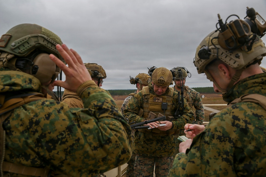 U.S. Marines with 3rd and 4th Naval Gunfire Liaison Company, Force Headquarters Group, Marine Forces Reserve, prepare for a tactical air-control party (TACP) exercise at Rattlesnake Range, Hattiesburg, Mississippi, Dec. 2, 2025. TACP exercises prepare prospective joint terminal attack controllers and joint fires observers for formal schools. (U.S. Marine Corps photo by Lance Cpl. Payton Goodrich)