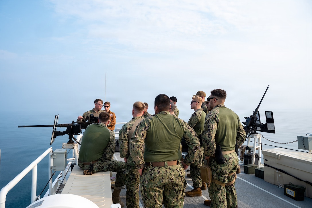 ARABIAN GULF (Dec. 8, 2025) U.S. Coast Guard Gunner’s Mate 2nd Class Nicholas Joppeck conducts a live-fire training exercise aboard the Sentinel-class fast-response cutter USCGC Clarence Sutphin Jr. (WPC 1147) in the Arabian Gulf. Clarence Sutphin Jr. is forward deployed to the U.S. 5th Fleet area of operations to support maritime security and stability in the U.S. Central Command area of responsibility. (U.S. Navy photo by Mass Communication Specialist 2nd Class Lindsay Lair)