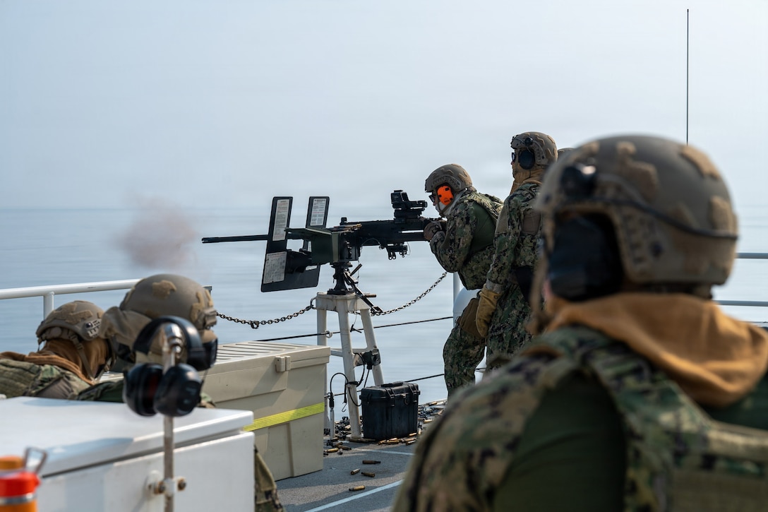 ARABIAN GULF (Dec. 8, 2025) A U.S. Coast Guardsman fires a .50 caliber machine gun during a live-fire training exercise aboard the Sentinel-class fast-response cutter USCGC Clarence Sutphin Jr. (WPC 1147) in the Arabian Gulf. Clarence Sutphin Jr. is forward deployed to the U.S. 5th Fleet area of operations to support maritime security and stability in the U.S. Central Command area of responsibility. (U.S. Navy photo by Mass Communication Specialist 2nd Class Lindsay Lair)