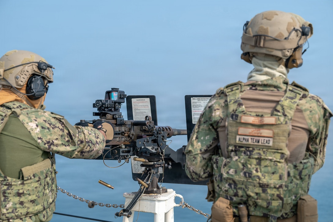 ARABIAN GULF (Dec. 8, 2025) U.S. Coast Guard Operations Specialist 1st Class Nathan Malinski fires .50 caliber machine gun during a live-fire training exercise aboard the Sentinel-class fast-response cutter USCGC Clarence Sutphin Jr. (WPC 1147) in the Arabian Gulf. Clarence Sutphin Jr. is forward deployed to the U.S. 5th Fleet area of operations to support maritime security and stability in the U.S. Central Command area of responsibility. (U.S. Navy photo by Mass Communication Specialist 2nd Class Lindsay Lair)