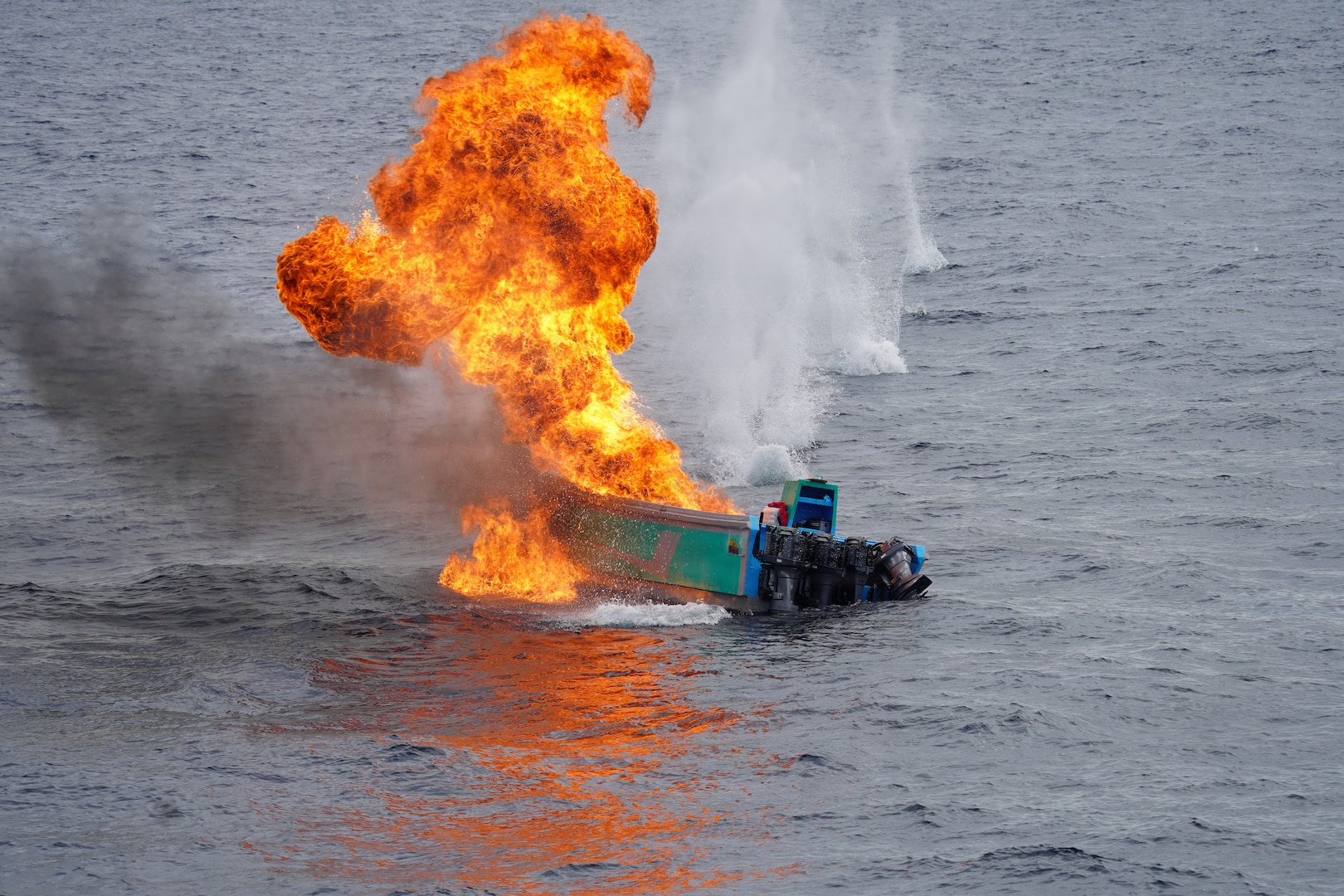 Coast Guard Cutter James' (WMSL 754) crew members use destructive fire to sink a suspected drug smuggling vessel approximately 202 miles southwest of the Galapagos Islands, Nov. 4, 2025. The interdiction was one of nine conducted by James’ crew in international waters of the Eastern Pacific Ocean. (U.S. Coast Guard photo by cutter James' crew)