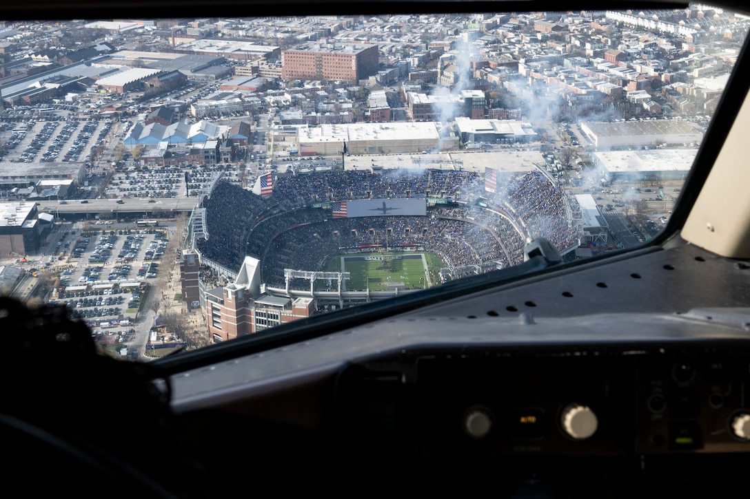 Photo of 89th Airlift Wing Baltimore Ravens flyover and military recognition