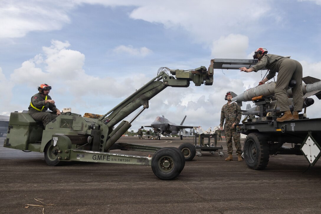 U.S. Marines with Marine Fighter Attack Squadron (VMFA) 225, U.S. Marine Corps Forces, South, utilize a Short for Airfield Tactical Support loader to move a GBU-54 Laser Joint Direct Attack Munition off a trailer at Jose Aponte de la Torre Airport in Ceiba, Puerto Rico, Oct. 31, 2025. U.S. military forces are deployed to the Caribbean in support of the U.S. Southern Command mission, Department of War-directed operations, and the president’s priorities to disrupt illicit drug trafficking and protect the homeland. (U.S. Marine Corps photo)