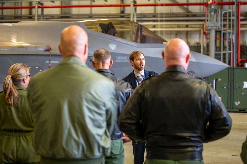 Brendon Andrus, U.S. Air Forces in Europe – Air Forces Africa, Fifth Generation Integration branch chief, speaks with members of the European Air Chiefs in front of a U.S. Air Force F-35A Lightning II assigned to the 48th Fighter Wing located at RAF Lakenheath, England, prior to a cross-servicing weapons load demonstration at Ramstein Air Base, Germany