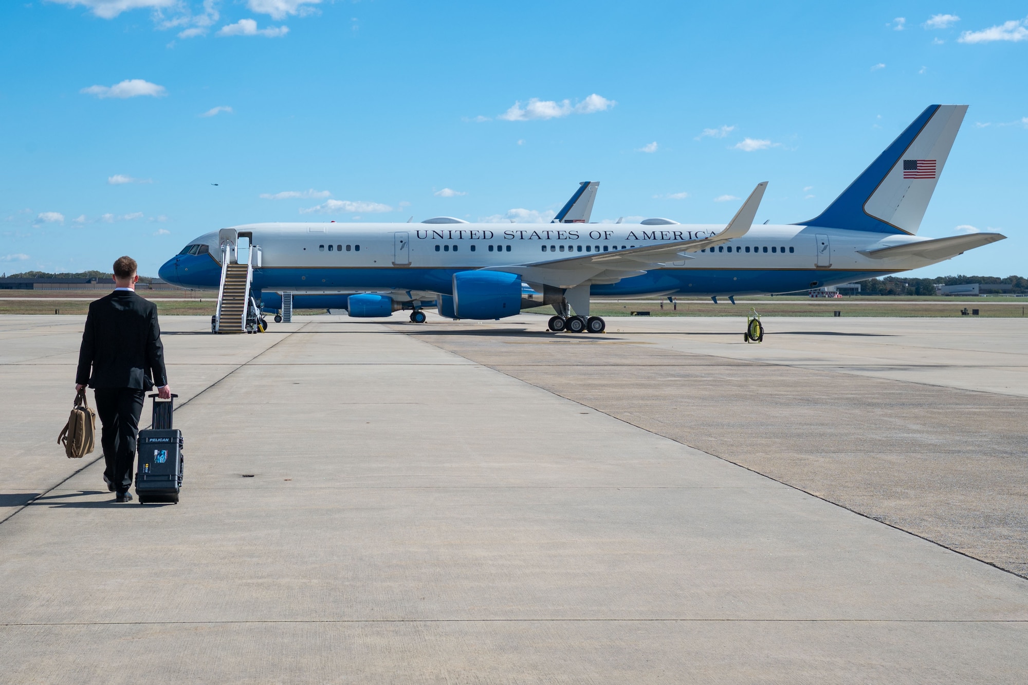 Person walks to plane