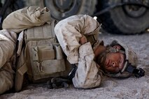 U.S. Marine Corps Lance Cpl. Seth Bower, an artillery mechanic with Battery G, 2nd Battalion, 11th Marine Regiment, sleeps between fire missions during the 11th Marine Regiment's Desert Fire Exercise aboard Marine Corps Air-Ground Combat Center 29 Palms, Calif. April 27, 2013. 11th Marines conducted an artillery desert firing exercise to maintain their combat proficiency via realistic combat scenarios. (U.S. Marine Corps photo by Lance Cpl. Sean Searfus, 1st Marine Division/Released)