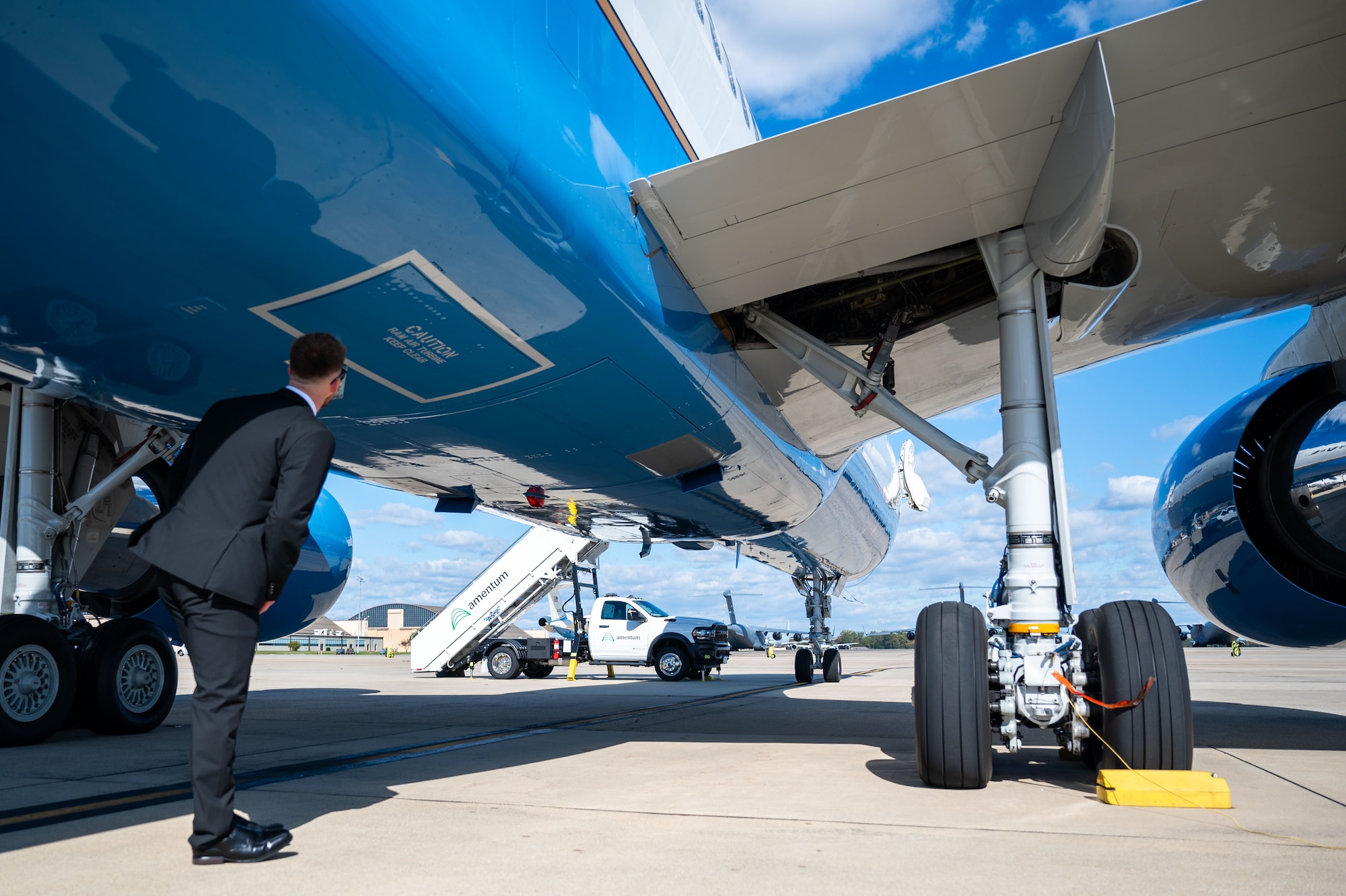 Person inspects plane