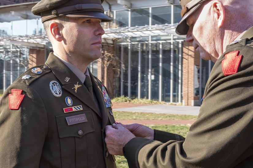 Maj. Michael Tier assumed command of 1st Battalion, 111th Infantry Regiment, 56th Stryker Brigade Combat Team from outgoing commander Lt. Col. David Fittipoldi during a change-of-command ceremony Dec. 7 at Independence Hall in Philadelphia. The 1-111th was founded by Benjamin Franklin on Dec. 7, 1747, and is one of the oldest units in the Pennsylvania National Guard. (U.S. Army National Guard photo by Staff Sgt. Ivan Mendez-Roman)
