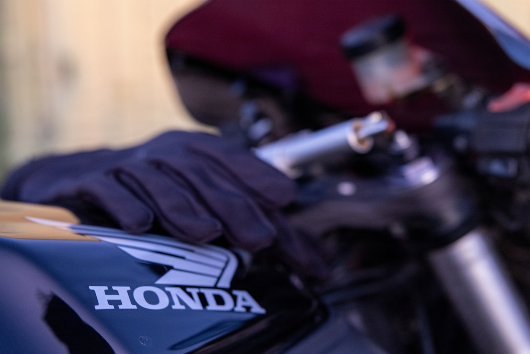 U.S. Marines and civilians with the Provost Marshal's Office with Headquarters and Support Battalion conduct personal protective equipment, registration, and insurance inspections during Operation Full Stop at Marine Corps Base Camp Pendleton, California, Dec. 1, 2025. Operation Full Stop is designed to ensure 100% compliance with motorcycle personal protective equipment and legal regulations. (U.S. Marine Corps photo by Cpl. Jacqueline Akamelu)