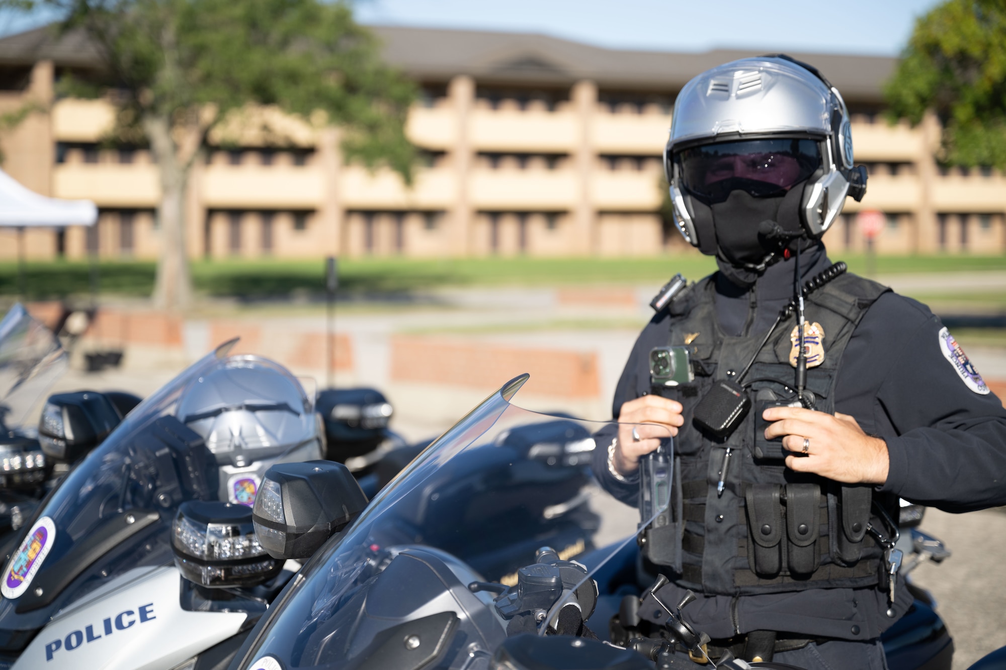 Person sits on motorcycle