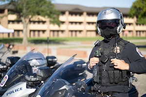 Person sits on motorcycle