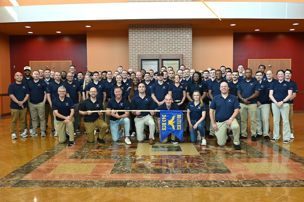 Members of the 343rd Recruiting Squadron gather for a squadron photo at their semi-annual training conference in La Vista, Nebraska, July 14, 2025.