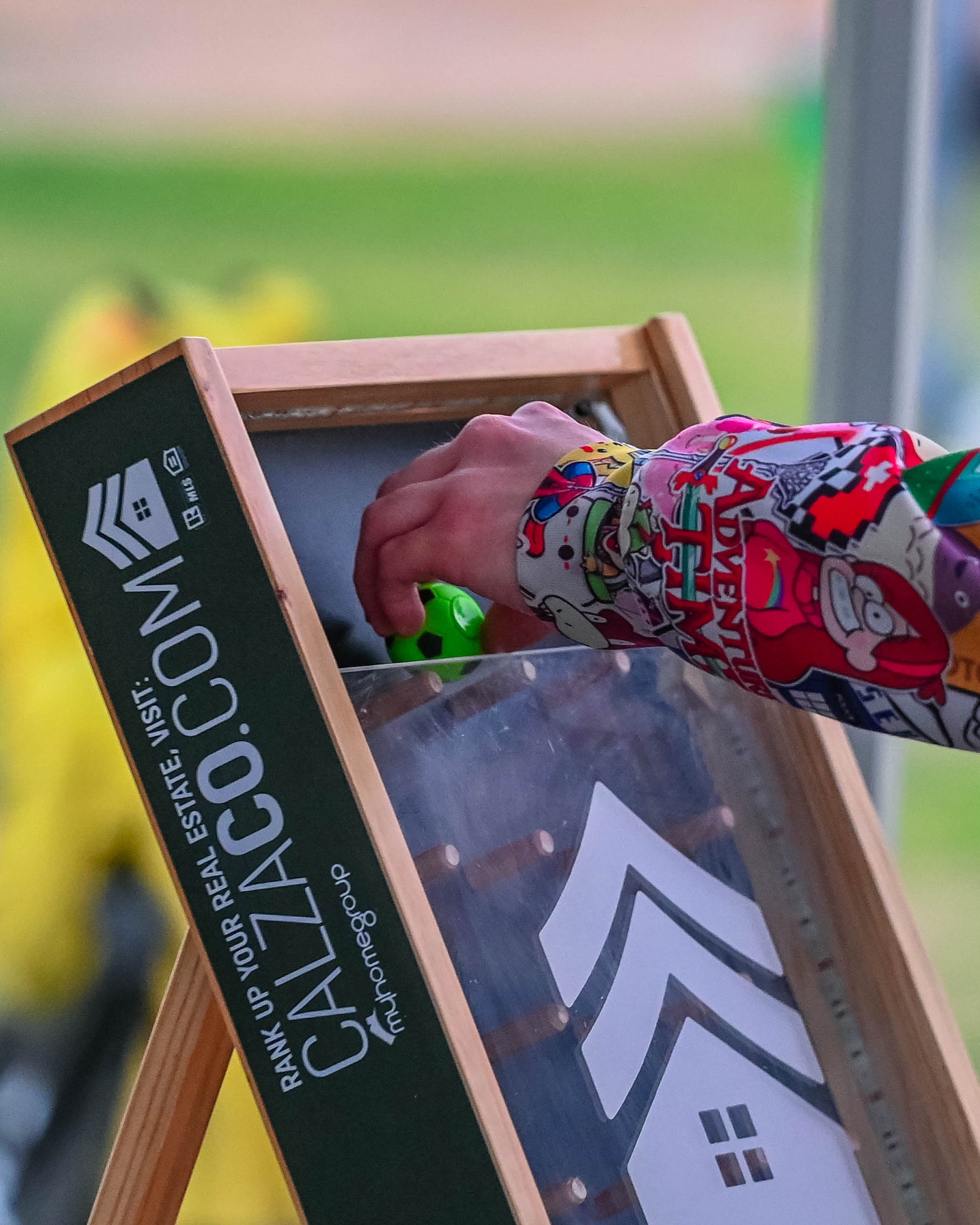 A military child plays pinball, Dec. 5, 2025, at Luke Air Force Base, Arizona.