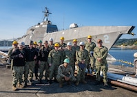Sailors from TRFB pose for a photo during the Corrosion Control Program Training.