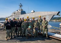 Sailors from TRFB pose for a photo during the Corrosion Control Program Training.