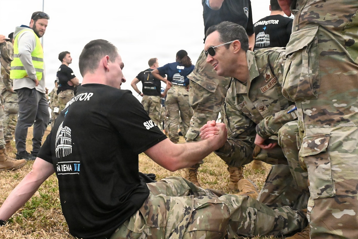 Guardian Arena competitors push their physical limits during the third annual Guardian Arena at Patrick Space Force Base, Fla., Dec. 9, 2025. Thirty-five teams, comprised of U.S. Space Force Guardians, U.S. Air Force Airmen, civilians, and representatives from international allies and partners, took part in the world’s largest Space Force exercise. The competition emphasizes the importance of cultivating a combat-ready mindset, connecting military and civilian space enterprises, and building esprit de corps by putting the Guardian Ideals into action. (U.S. Air Force photo by Chad Trujillo)