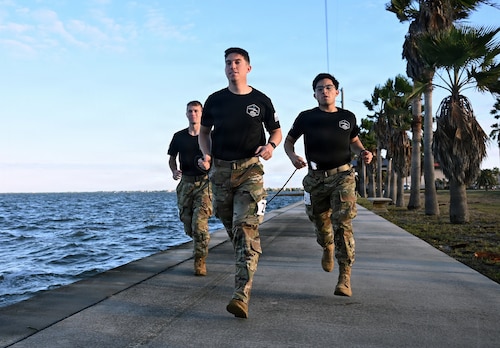 Guardian Arena competitors push their physical limits during the third annual Guardian Arena at Patrick Space Force Base, Fla., Dec. 9, 2025. Thirty-five teams, comprised of U.S. Space Force Guardians, U.S. Air Force Airmen, civilians, and representatives from international allies and partners, took part in the world’s largest Space Force exercise. The competition emphasizes the importance of cultivating a combat-ready mindset, connecting military and civilian space enterprises, and building esprit de corps by putting the Guardian Ideals into action. (U.S. Air Force photo by Chad Trujillo)