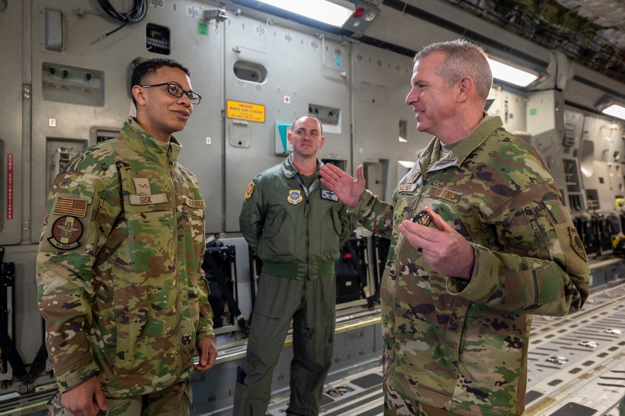 U.S. Air Force Maj. Gen. Charles Bolton, Eighteenth Air Force commander, and Chief Master Sgt. Joseph Arce, 18th AF command chief, recently concluded a visit to Joint Base Lewis-McChord, where they engaged with Airmen and leaders across the 62d Airlift Wing, 627th Air Base Group and other units.