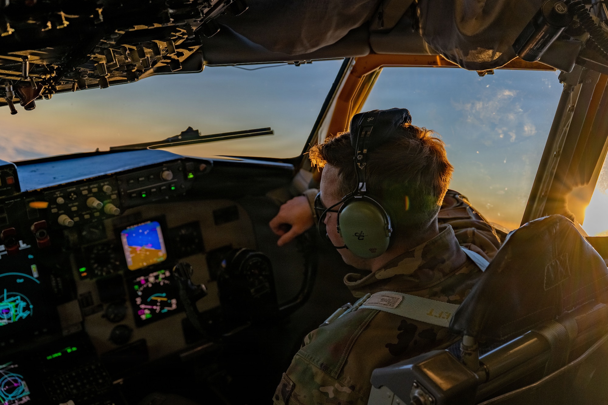 U.S. Air Force Capt. Kelby McWherter, 351st Air Refueling Squadron KC-135 Stratotanker pilot, checks his instruments during a flight over the Baltic Sea