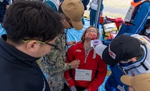 JOGASHIMA PARK, Japan (Nov. 9, 2025) — A U.S. Navy Hospital Corpsman assigned to U.S. Navy Medicine Readiness and Training Command Yokosuka works with Japanese responders to assess and treat a simulated casualty during Big Rescue Kanagawa 2025. The annual exercise is one of Kanagawa Prefecture’s largest disaster-response drills, involving U.S. Naval Hospital Yokosuka, Red Cross Yokosuka and Branch Health Clinic Atsugi personnel working alongside U.S. and Japanese agencies. (U.S. Navy photo by Daniel Taylor/USNMRTC Public Affairs)