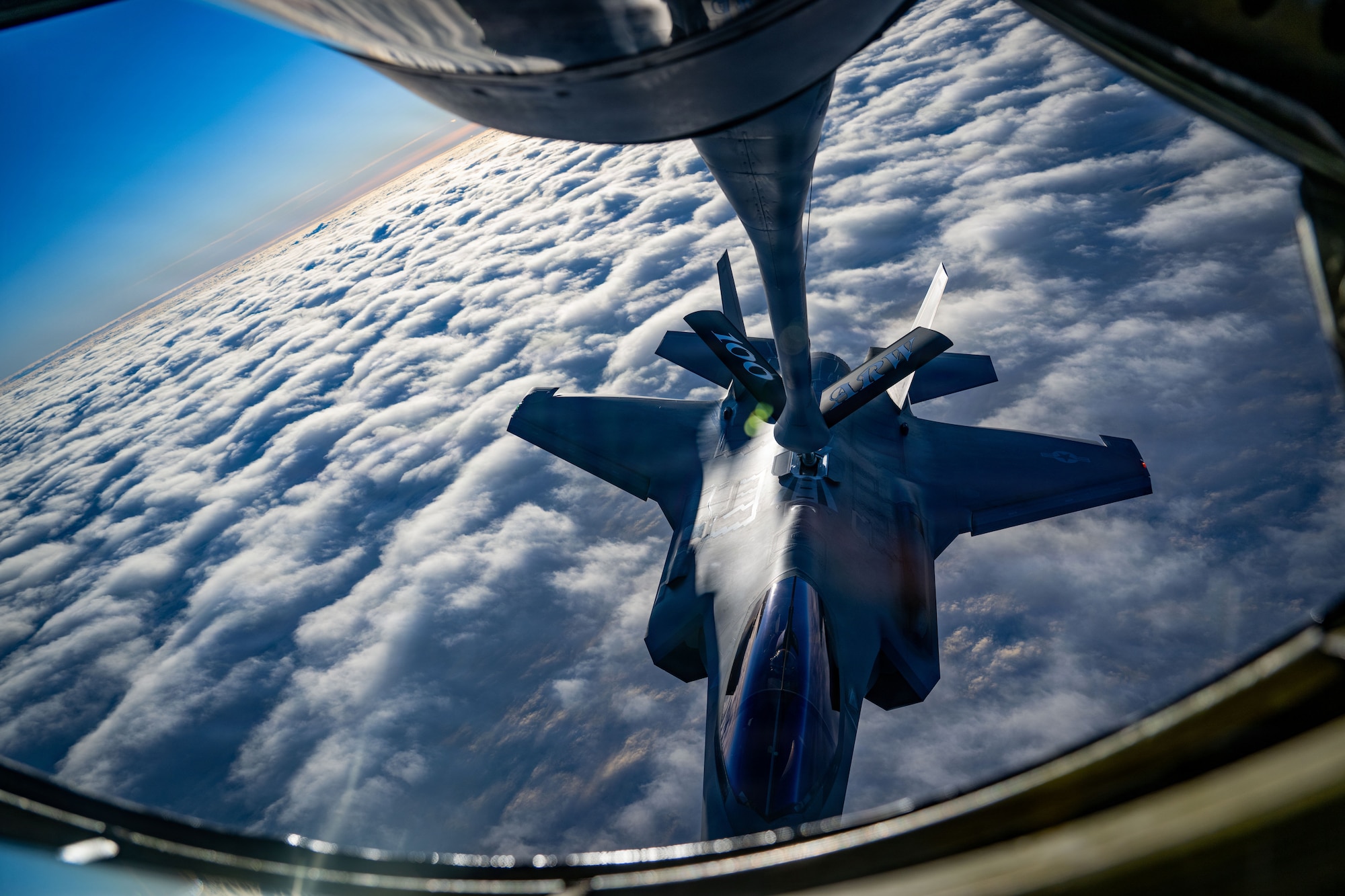 A U.S. Air Force 48th Fighter Wing F-35 Lightning II receives fuel from a 100th Air Refueling Wing KC-135 Stratotanker over the Baltic Sea