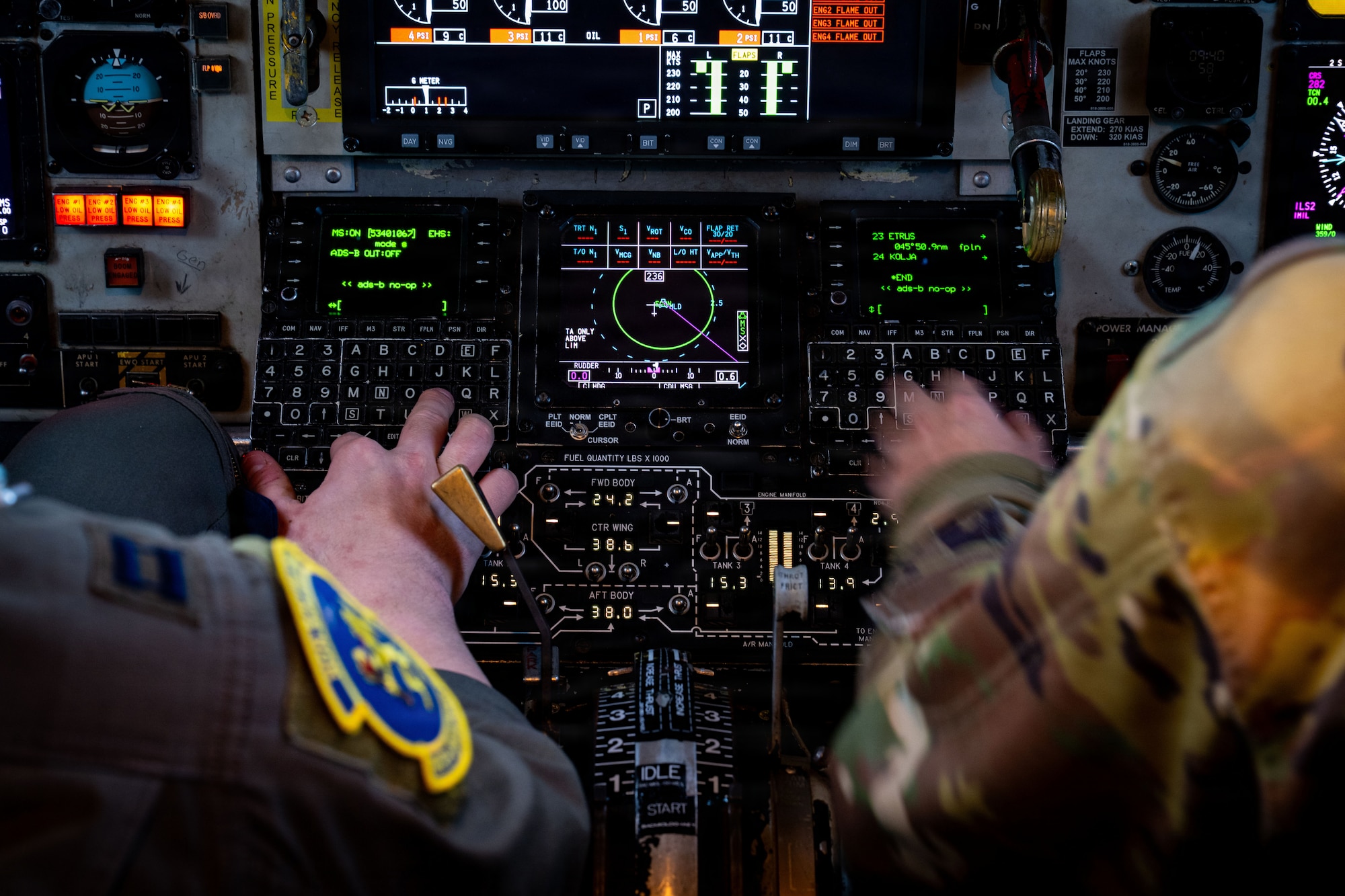 U.S. Air Force Capt. Patrick Gilbert and Capt. Kelby McWherter, 351st Air Refueling Squadron KC-135 Stratotanker pilots, perform preflight checks at RAF Mildenhall, England, before conducting an aerial refueling mission over the Baltic Sea