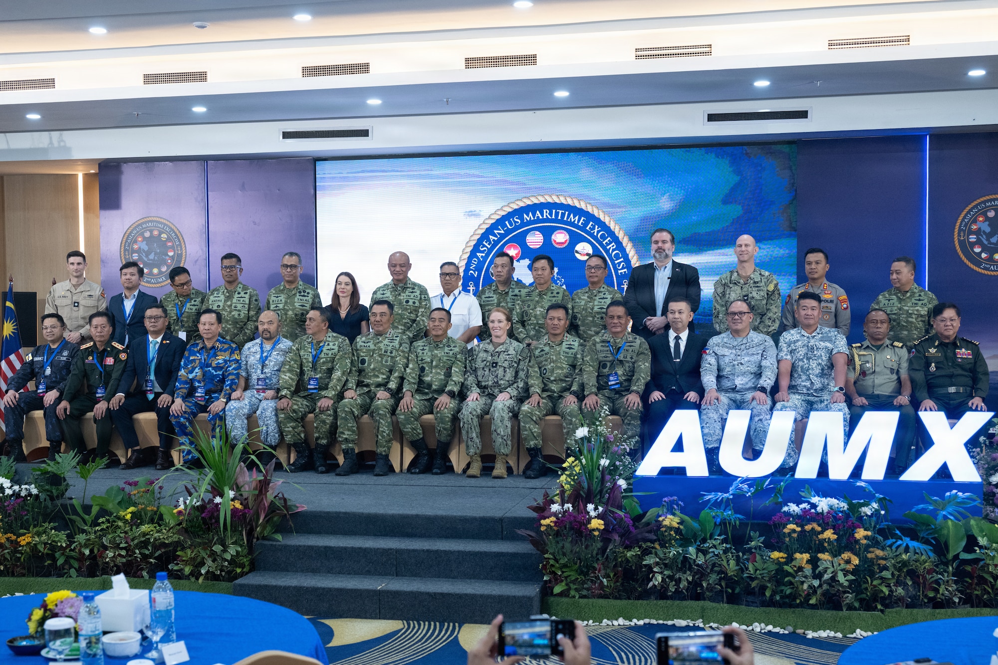 Heads of delegations and senior defense officials from the Association of Southeast Asian Nations pose for a group photo with during the Association of Southeast Asian Nations (ASEAN)-U.S. Maritime Exercise (AUMX) 2025, in Batam, Indonesia, Dec. 10, 2025. This is the second iteration of AUMX, designed to promote shared commitments to maritime partnerships, security, and stability in Southeast Asia. (U.S. Navy photo by Mass Communication Specialist 2nd Class Anthony Robledo)