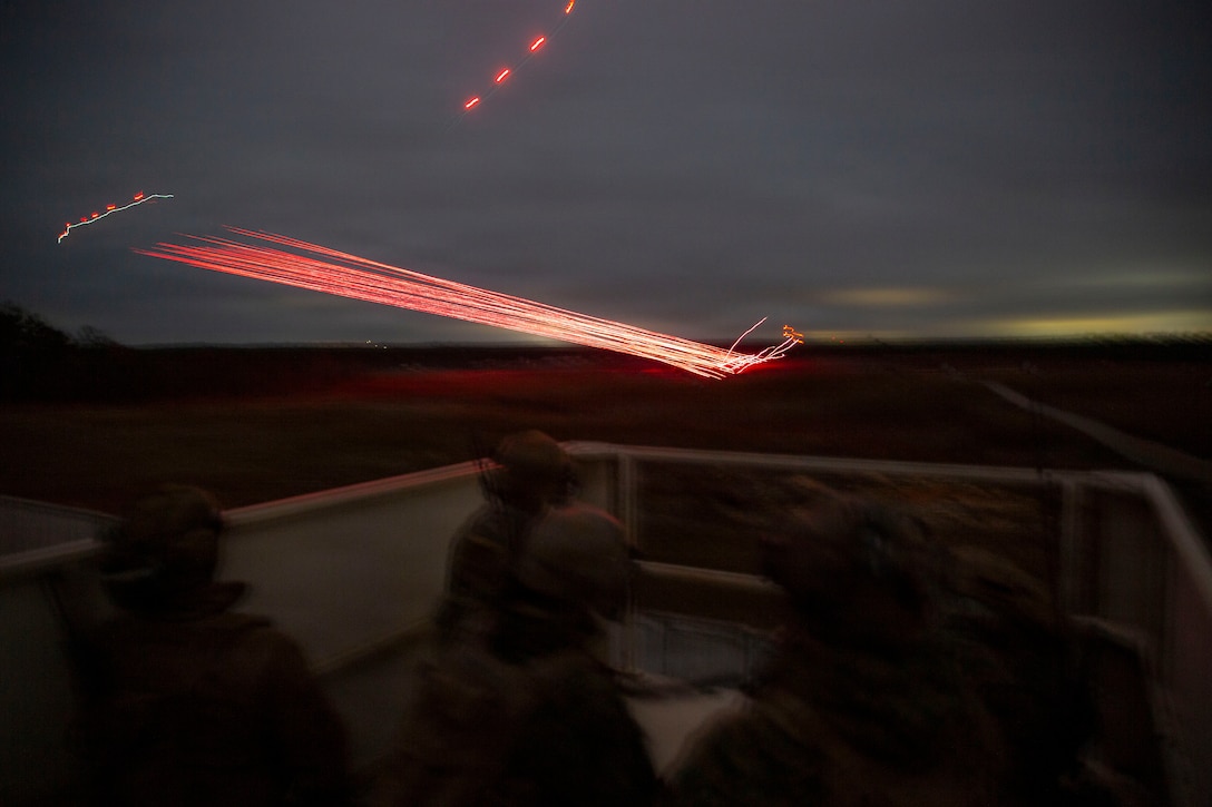 U.S. Marines with 3rd Naval Gunfire Liaison Company, Force Headquarters Group, Marine Forces Reserve, watch incoming close air support hit its target during a tactical air-control party (TACP) exercise at Rattlesnake Range, Hattiesburg, Mississippi, Dec. 2, 2025. TACP exercises prepare prospective joint terminal attack controllers and joint fires observers for formal schools. (U.S. Marine Corps photo by Lance Cpl. Payton Goodrich)