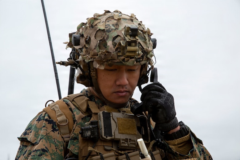 U.S. Marine Corps Staff Sgt. Brian Wu, a joint tactical air controller with 4th Naval Gunfire Liaison Company, Force Headquarters Group, Marine Forces Reserve, calls for close air support during a tactical air-control party (TACP) exercise at Rattlesnake Range, Hattiesburg, Mississippi, Dec. 2, 2025. TACP exercises prepare prospective joint terminal attack controllers and joint fires observers for formal schools. (U.S. Marine Corps photo by Lance Cpl. Payton Goodrich)