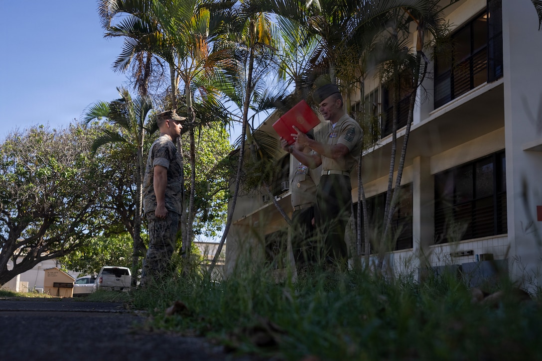 Maj. Daniel J. Pacheco, an assistant air officer with 3d MLR,  was awarded the Navy Commendation Medal after helping save a fellow Marine's life following  a motorcycle crash on the Pali highway. Reynolds is a native of Pennsylvania and Pacheco is a  native of California. (U.S. Marine Corps photo by Cpl. Iyer Ramakrishna)